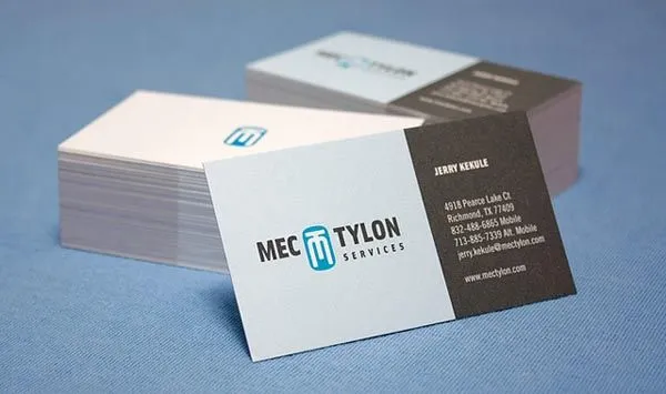 Creative business card design for Mec Tylon Services, featuring a modern layout with a two-tone color scheme and clear contact details.